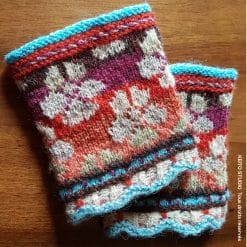 manchette tricot jacquard tons oranges mauve et bleu