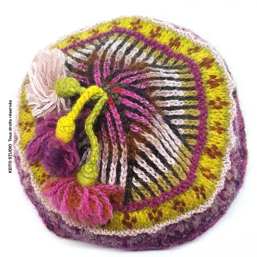 bonnet jacquard tons mauves et vert