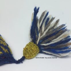 pompon stylé avec capuchon au crochet