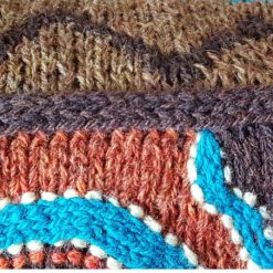 détail bordure coussin style aborigène