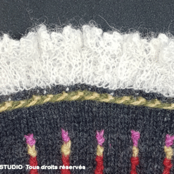 détail de dentelle au tricot pour manchettes norvégiennes